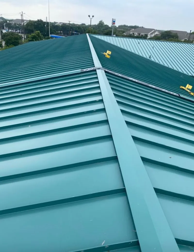 Green commercial metal roof ridge and valley for Metal Roof Repair in Brier