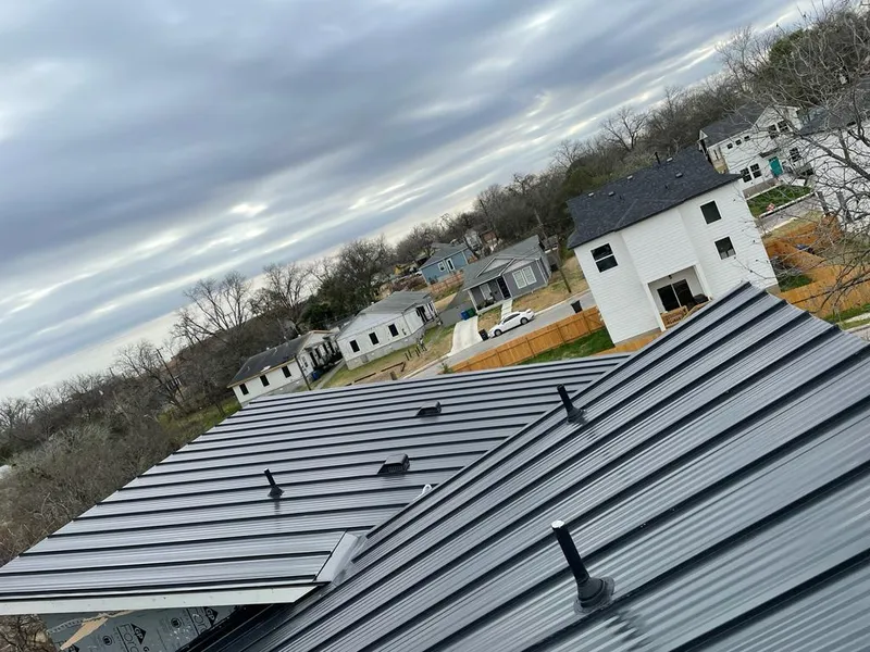 Standing seam metal roof panels with vents for Skylight Repair in Brier